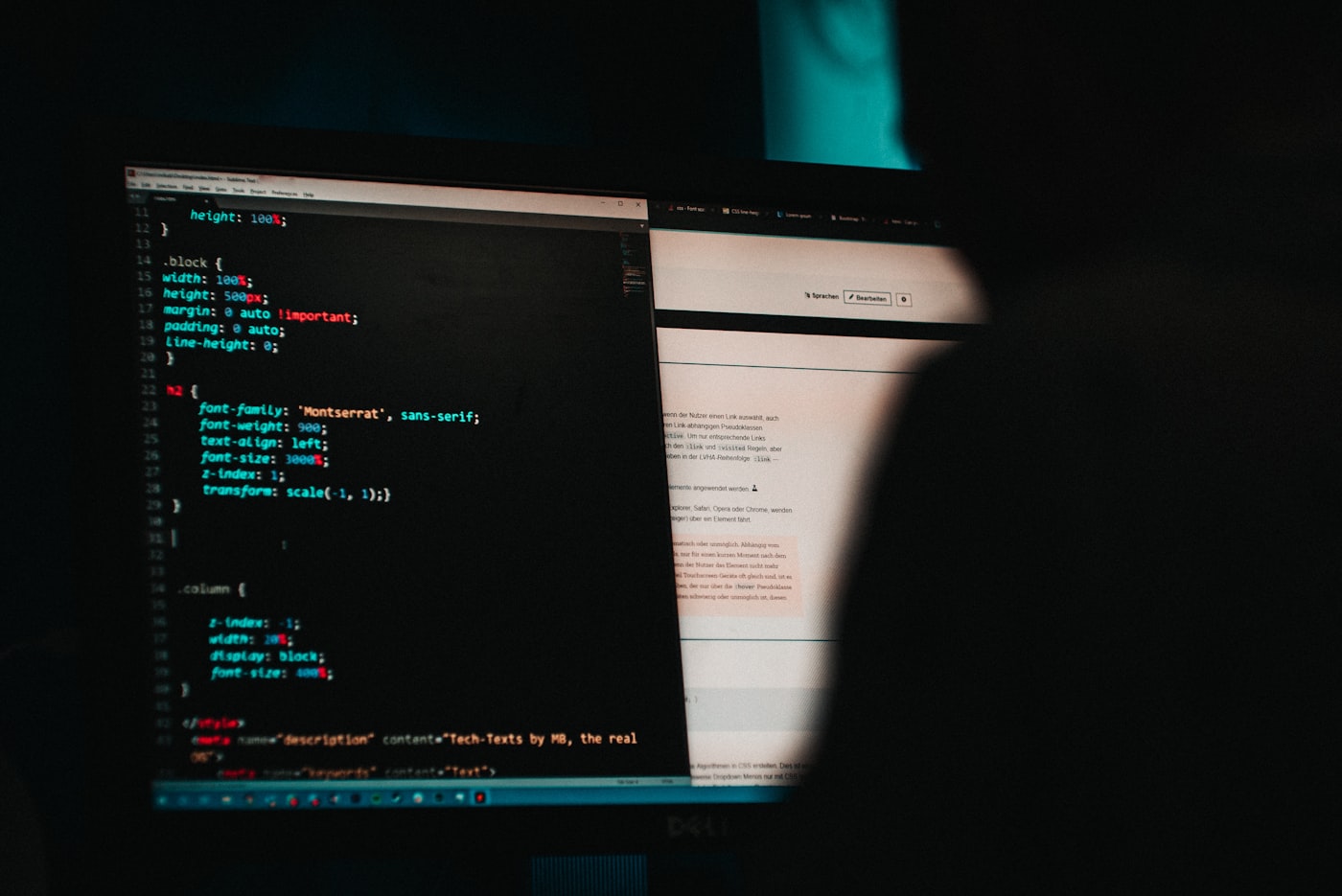 Silhouetted person at a computer screen filled with code, suggesting a hacker at work