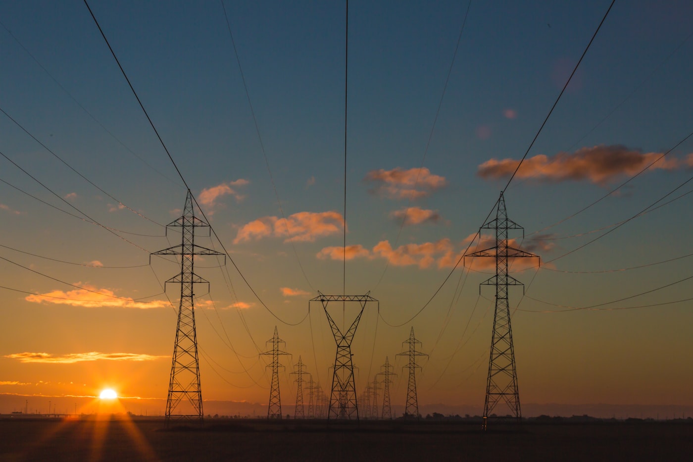 High-voltage power lines against the sky