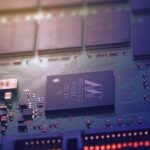 Green circuit board with microchips and wiring