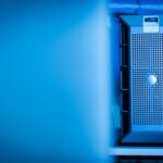 Close-up of modern server unit in blue-lit data center environment