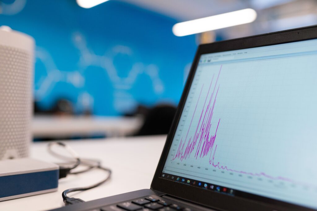 Graph and analytics displayed on laptop screen