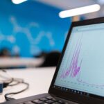 Graph and analytics displayed on laptop screen