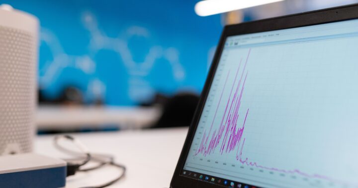 Graph and analytics displayed on laptop screen