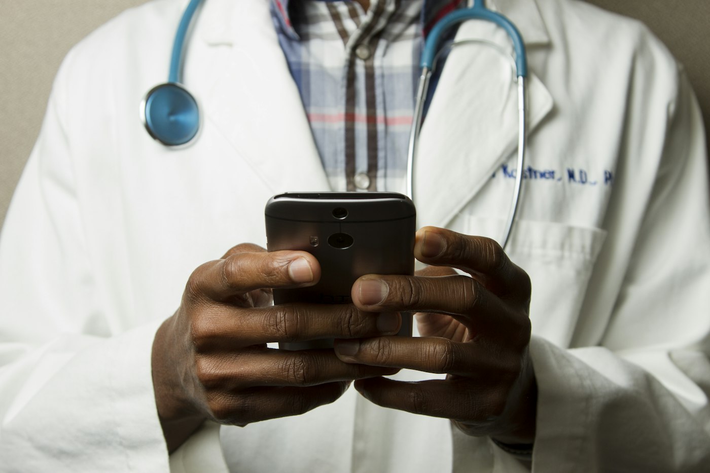 Clinician reviewing medical information on a tablet
