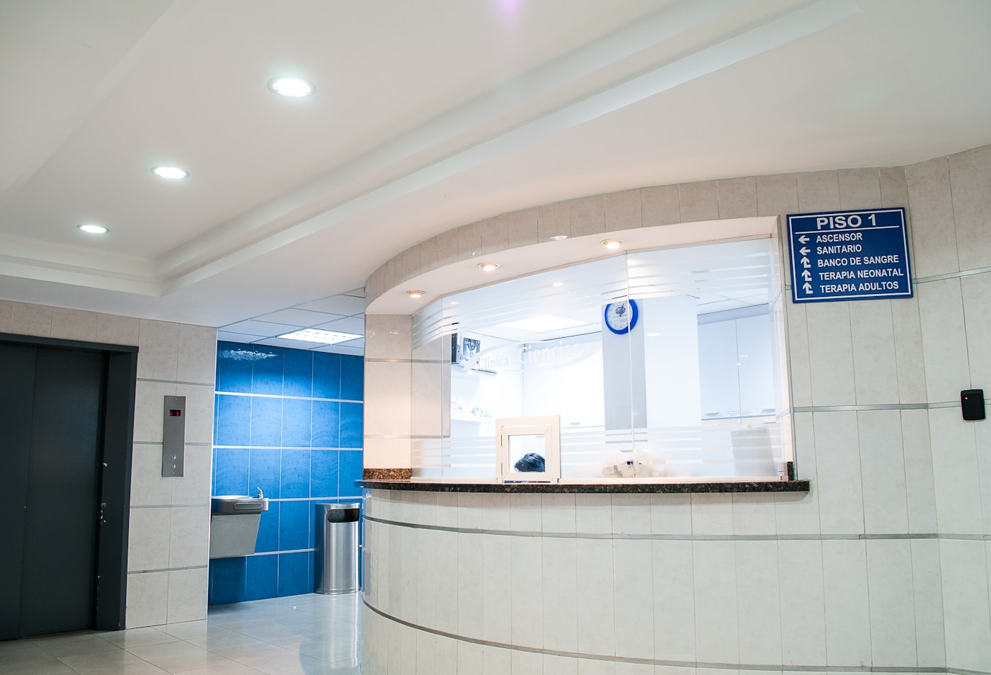 Hospital corridor with clinical lighting