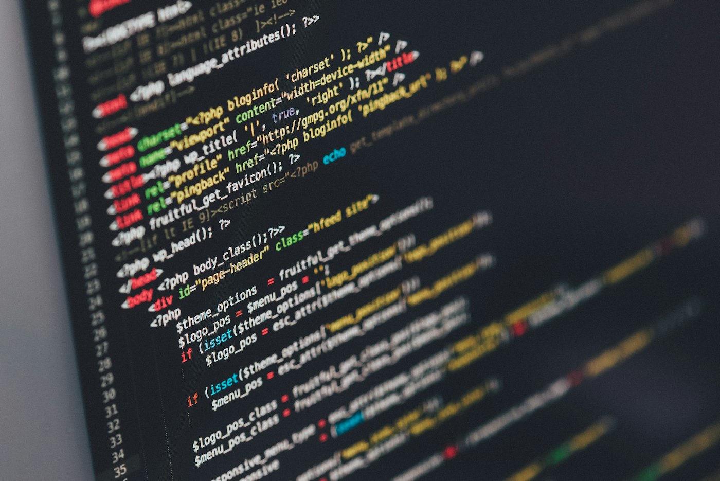 Developer coding on a monitor