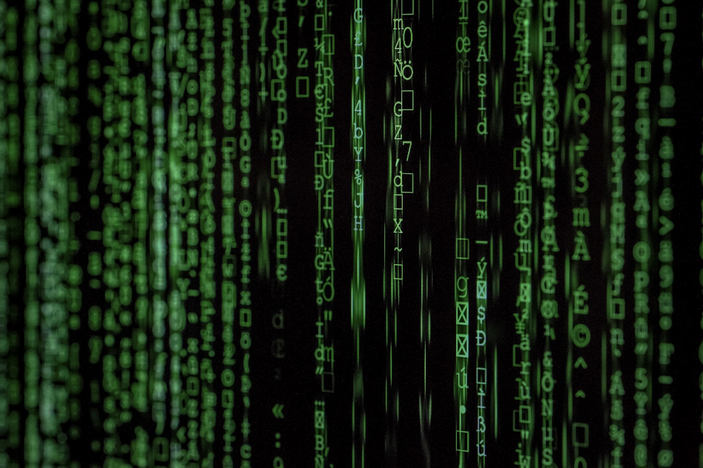 Green matrix-style code on a dark screen
